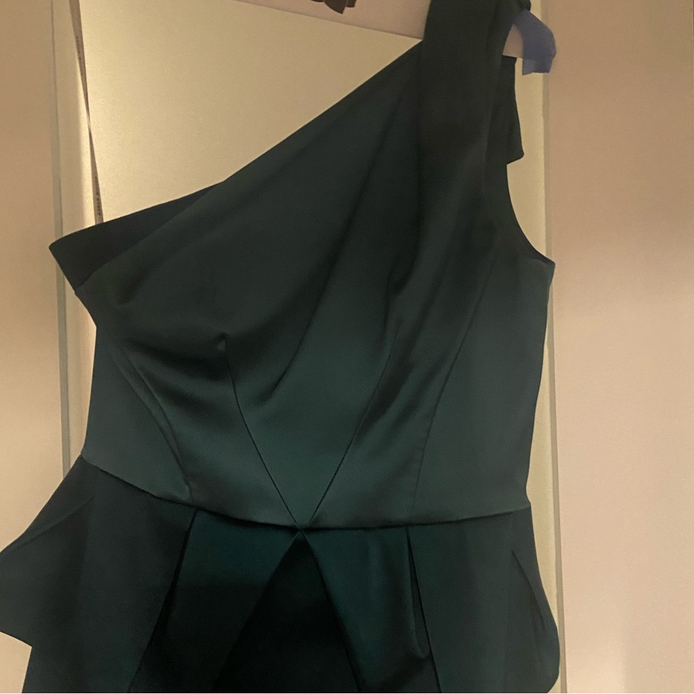 Excellent condition. Worn once to a wedding.